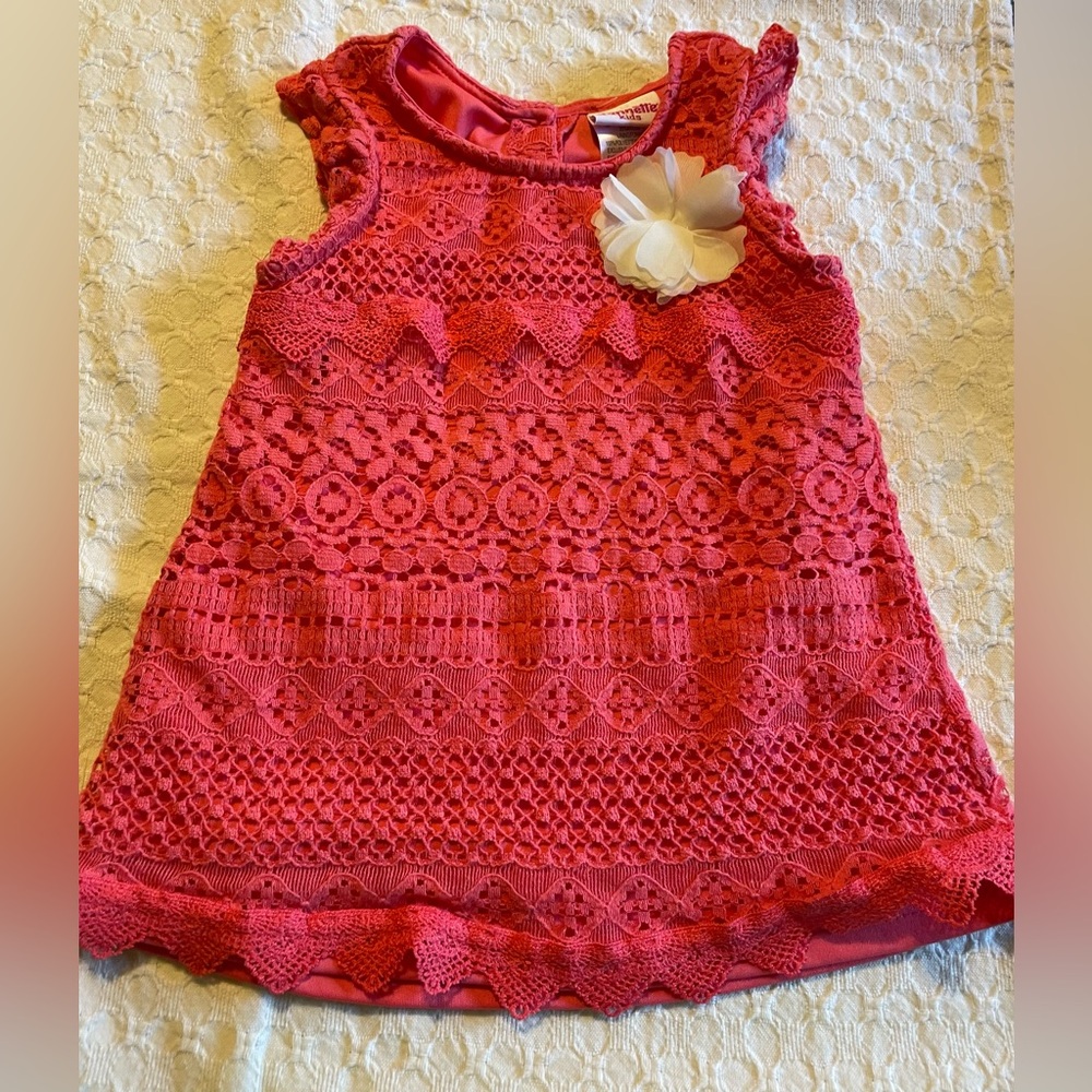 Girls sz 4T dress. Salmon colored lined crochet-look dress. White flower L chest